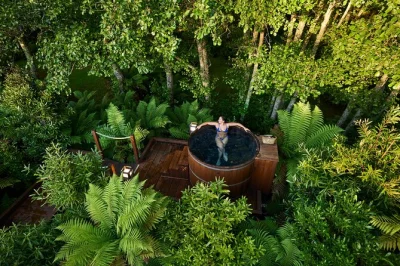 Let yourself unwind in a private cedar hot tub in rotorua’s whakarewarewa forest, with stream views, craft drinks, and tub-side service. includes 45-minute soak.