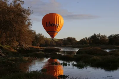 Feel the sunrise over avon valley on a perth hot air balloon flight, help set up if you like, and share breakfast after landing. includes all ages 6+.