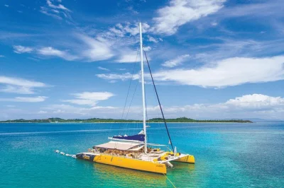Feel the breeze on a full-day fiji sailing tour through the mamanuca islands, with snorkeling, sand cays, gourmet lunch, drinks, and hotel pickup included.