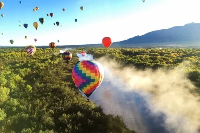 Feel the morning air over albuquerque with a small-group hot air balloon flight, guided by locals. includes pickup, light snacks, and a celebratory champagne toast.