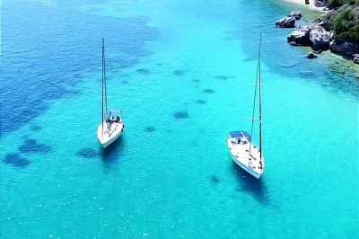 Set sail from corfu on a private yacht cruise, with swim stops at vido island and garitsa bay, venetian views, snacks, drinks, and a friendly skipper included.