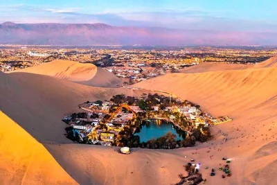 Wake up early in lima for a day trip with boat tour to ballestas islands, wild sea lions, huacachina oasis sandboarding, and sunset dunes. includes pickup & guide.