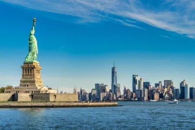 Feel the pulse of nyc on a full-day tour with subway rides, ferry to lady liberty, and skyline views from freedom tower. includes local guide and all main sights.