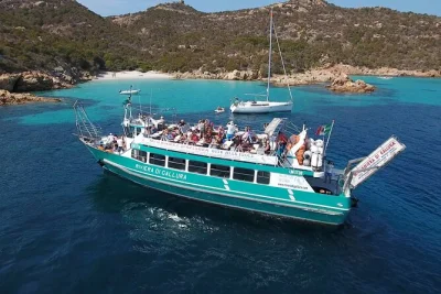 Slip into sardinia’s wild side on a la maddalena day trip by boat, with long beach stops, turquoise swims, and time to wander the island’s historic center. includes restroom onboard.