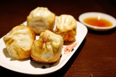 Follow a local guide through shanghai’s huangpi road for late-night soup dumplings, craft beers, and classic dishes—includes tastings and easy metro meetup.