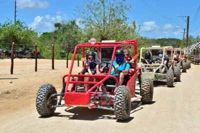 Feel the rush of a punta cana dune buggy tour, taste dominican coffee & chocolate, swim in a water cave, and relax at macao beach. includes hotel pickup.