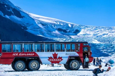 Feel the crunch of ancient ice, walk the glacier skywalk, and ride the ice explorer on a full-day trip from banff with lunch and hotel pickup included.