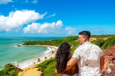 Swim in warm waters at coqueirinho, tambaba & tabatinga on a guided costa do conde day trip from joão pessoa. includes hotel pickup and local guide.