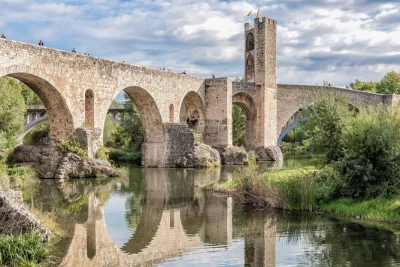 Step onto cobbled streets in besalú, vic, santa pau & castellfollit de la roca on this small-group tour from barcelona—includes hotel pickup & local guide.