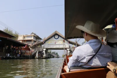 Feel the buzz of bangkok’s floating market, ride a long-tail boat, and watch a train slice through maeklong market. includes pickup, guide, and all entry fees.