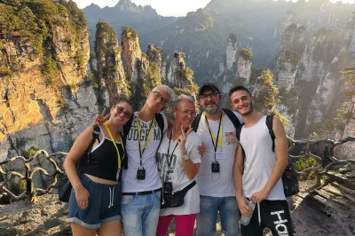 Feel the thrill of zhangjiajie’s avatar peaks, walk the glass bridge over the canyon, and ride the bailong elevator—all with hotel pickup and a small group guide.