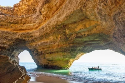 Feel the thrill of a benagil cave boat tour from armação de pêra, glide past wild algarve beaches, and see hidden sea arches with a local captain—includes life jackets.