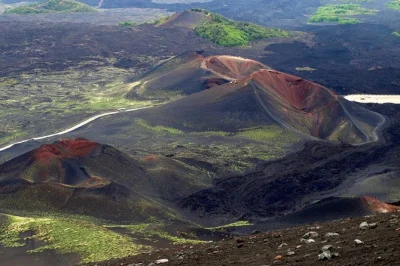 Feel the crunch of etna’s black earth, trek old craters, explore a lava cave and gaze into valle del bove—all with pickup from catania and a local guide.