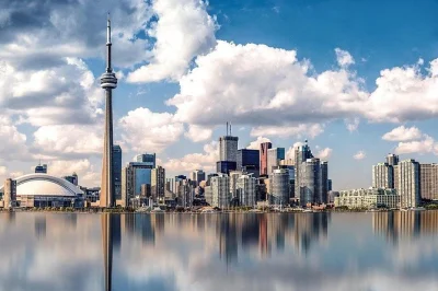 Feel the city pulse in toronto, ride a niagara falls boat, and gaze from the cn tower. includes hotel stay, transport, and local guide for easy booking.