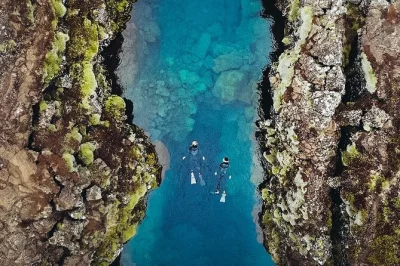 Float between continents at silfra with a private guide, all gear included. choose wetsuit or drysuit, get underwater photos, and warm up with hot chocolate.
