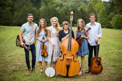 Feel the warmth of family harmonies at the little opry theatre in branson. enjoy live bluegrass, laughter, and americana roots music with your show ticket included.