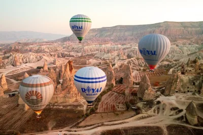 Float above cappadocia’s surreal valleys on a sunrise hot air balloon ride, with light breakfast, hotel pickup, and a medal to remember it all. book your spot early.
