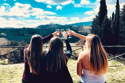 Feel the warmth of chianti’s vineyards, taste local wines, explore san gimignano’s medieval streets, and enjoy a tuscan lunch with a world-champion gelato stop. includes pickup.