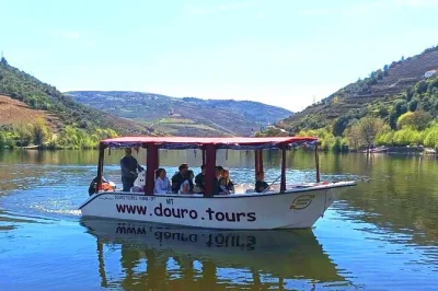 Float along the douro river in pinhão with a local guide, sip port wine, and soak up vineyard views. includes a glass of port and onboard presentation.
