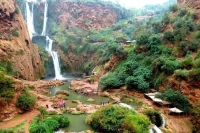 Feel the spray at ouzoud waterfalls on a small group day trip from marrakech, with boat ride, pickup and drop off included. relaxed pace, local driver, atlas scenery.