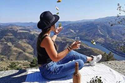 Lose track of time in douro valley with a wine estate tour, riverside lunch, and a scenic rabelo boat cruise—all with pickup from porto and a friendly local guide.