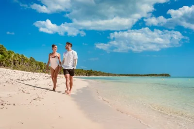 Step into cozumel’s kuzÁ beach park for a relaxed day of white sand, beach games, nature trails, live music, and shaded loungers—includes full-day access.