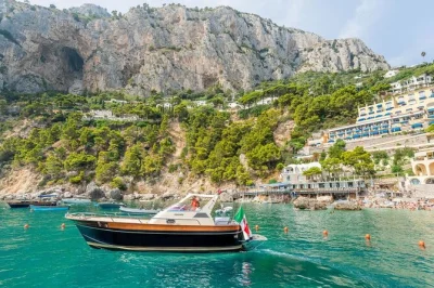 Feel the sea breeze on a capri boat tour from sorrento, with swimming stops, prosecco, and local guides. includes pickup, drinks, and time to explore capri.