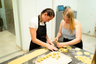 Roll up your sleeves in rome and make fresh pasta, gnocchi, and tiramisù with a local chef. enjoy wine tasting, hands-on lessons, and eat what you create—vegetarian options too.
