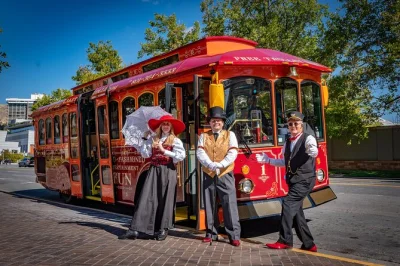 Step onto a vintage trolley in salt lake city for a sightseeing show with three theatrical guides, classic snacks, and stories behind iconic landmarks. includes treats.