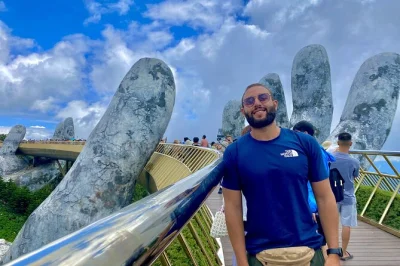 Step onto the golden bridge at ba na hills, ride asia’s longest cable car, wander french village, and enjoy buffet lunch. includes pickup from da nang hotels.