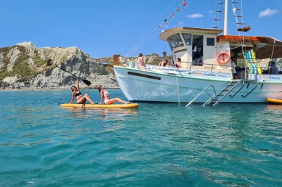 Set sail from argostoli for a relaxed boat cruise to white rocks beach, vardiani island & xi beach. swim, eat homemade greek food, and sip local wine on board.