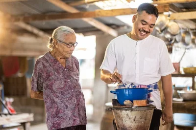 Chop herbs at a koh samui market, cook with geng’s family in their open kitchen, and taste your own thai curry. includes pickup, lunch, and hands-on lessons.