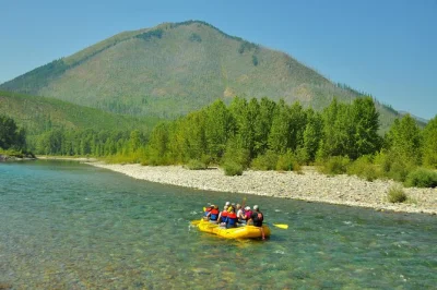 Float the middle fork of the flathead river near glacier, spot wildlife, and relax with a local guide. includes life jacket and optional shoe rental. easy booking.