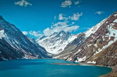 Wake up to the andes on this santiago day trip with a family-run vineyard tasting, llama encounters, and time at the legendary inca lagoon. includes pickup.