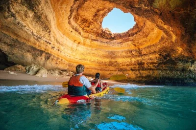 Feel the atlantic breeze as you kayak into benagil cave, pause at praia da marinha’s arches, and wander hidden beaches—includes gear and local guide.