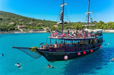 Swim at croatia’s blue lagoon, snorkel a secret underwater museum, and enjoy lunch with unlimited drinks on a split day trip—includes gear and local dj.