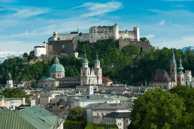 Feel salzburg’s old town, stroll mozart’s street, and cross lake wolfgang by private boat. includes guide, air-conditioned bus, and city map for easy exploring.