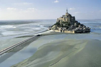 Feel the first glimpse of mont saint michel rise from the bay, ride a comfy shuttle from bayeux, skip the lines at the abbey, and wander cobbled lanes at your own pace.