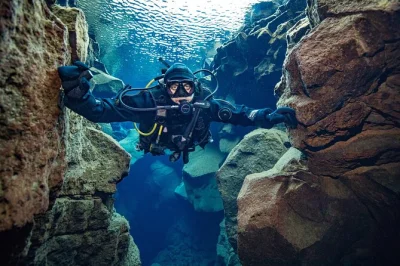 Feel the chill of silfra’s crystal waters as you dive between tectonic plates in iceland, guided by local experts. includes equipment, drysuit, and hot cocoa after.