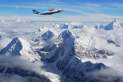 Feel the rush of a scenic everest flight from kathmandu with hotel pickup, close-up himalayan views, and a glass of sparkling wine after landing. includes breakfast snacks.