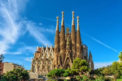 Feel the pulse of barcelona on a full-day tour with sagrada familia, park güell, gothic quarter strolls, and montjuïc views. includes hotel pickup.