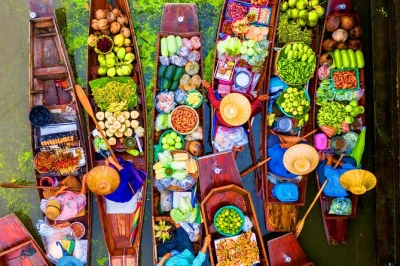 Feel the thrill of the maeklong train passing through a bustling market, then drift by boat through damnoen saduak’s floating stalls—includes guide & audio in 28 languages.