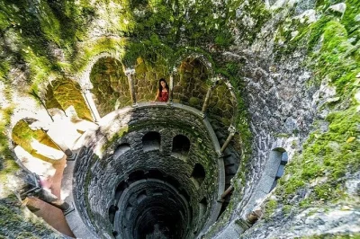Step into sintra’s quinta da regaleira with skip-the-line entry, a host’s welcome, and your own map. explore mystical wells, tunnels, and gardens at your pace.