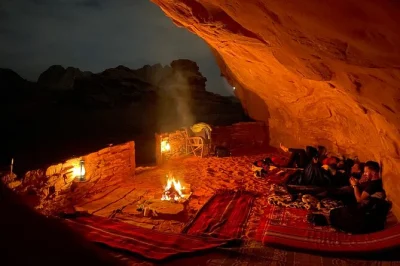 Sleep in a wadi rum cave, ride a jeep to hidden bridges and canyons, and share a bedouin-cooked dinner under the stars. includes guide, meals, transport.