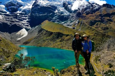 Wake up early in cusco for a guided hike to humantay lake, breakfast in mollepata, a local offering ceremony, and lunch before your return—hotel pickup included.