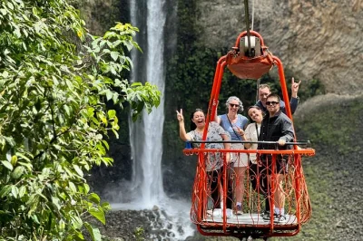 Feel the rush of baños on a full-day tour from quito—swing at casa del Árbol, cross the pastaza river by cable car, and taste salcedo ice cream. includes entrances and local guide.