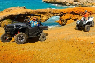 Feel the wild side of aruba by utv or atv—explore secret beaches, swim in a cave pool, and visit gold mill ruins with pickup and local guides included.