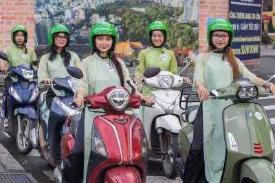 Feel saigon’s night pulse by motorbike, taste street food with locals, wander the district 10 flower market, and end with bánh mì—includes hotel pickup.