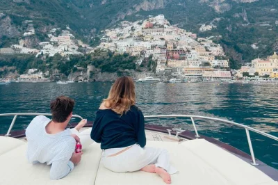 Slip past sorrento’s traffic by boat, swim at li galli islands, and wander positano & amalfi with a small group—includes hotel pickup, drinks, and snacks onboard.