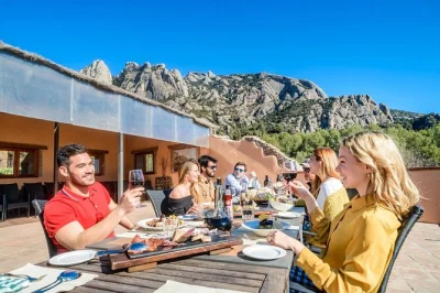 Leave barcelona for montserrat’s mountain monastery, then unwind over a catalan farmhouse lunch with local wine. includes small group guide and pickup.